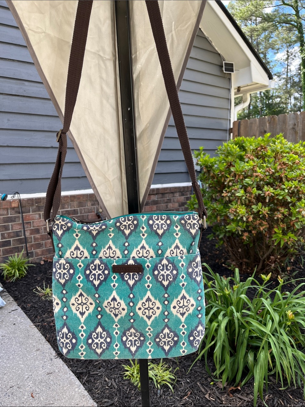 Teal Patterned Crossbody Bag with Adjustable Brown Strap